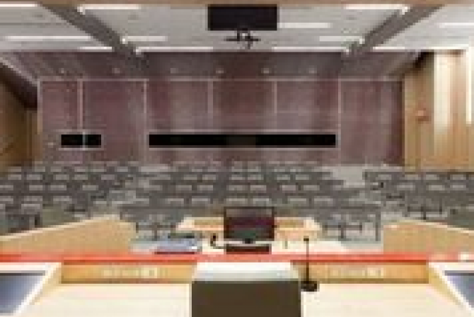 View from behind the judge's desk of the empty courtroom