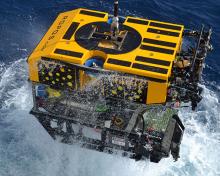Remotely operated vehicle being pulled out of the ocean