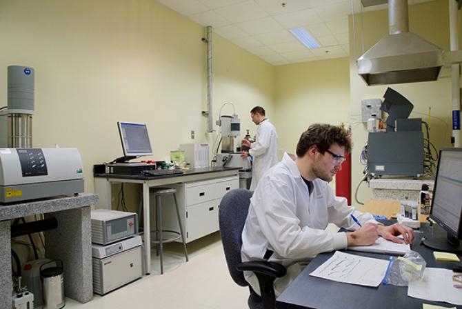 Two people at work in a lab