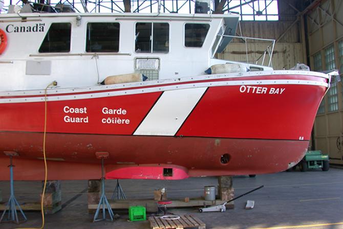 A hydrographic sensor pod mounted on the bottom of a Coast Guard vessel