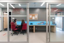 Office of the Neuroscience Clinical Research labs seen through a glass wall