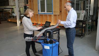 Two people testing the research infrastructure